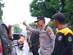 Polres Ponorogo Kawal Ribuan Warga PSHWTM Saat Suran Agung di Madiun