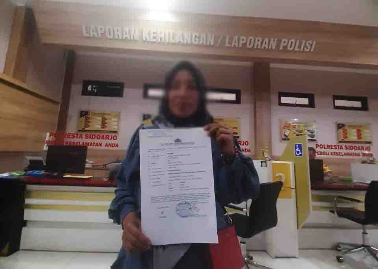Muslimah usai laporan di SPKT Polresta Sidoarjo