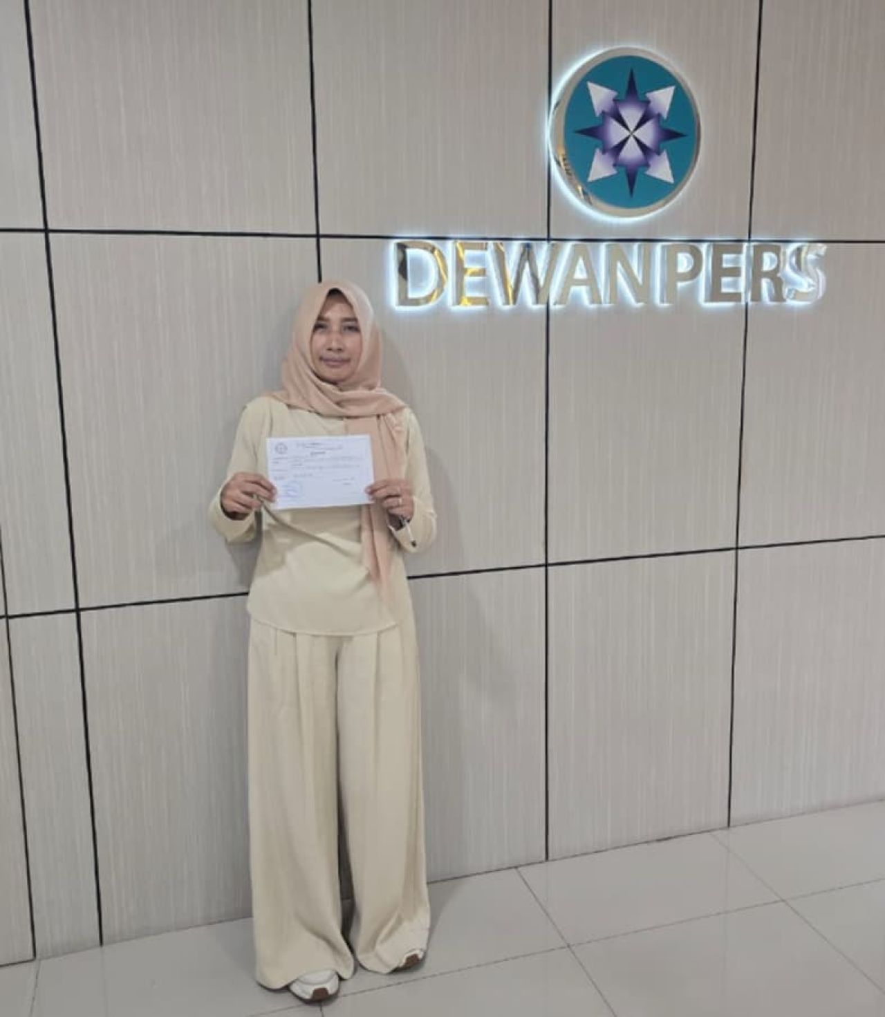 Wiwik Tri Haryati pengacara asal Pandaan usai melaporkan media online CBN-Indonesia.com ke Dewan Pers